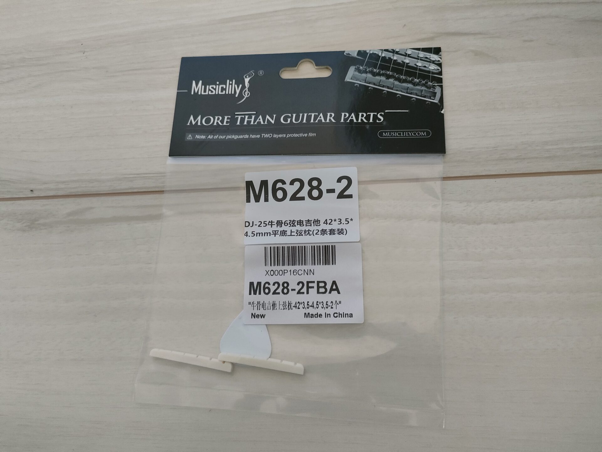 Musiclily エレキギター弦溝加工済み牛骨ナット 6弦フェンダーストラト/テレキャスターギター用、42x3.5x4.5mm (2個)